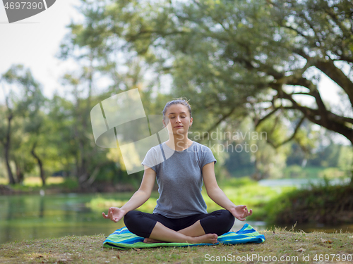 Image of woman meditating and doing yoga exercise