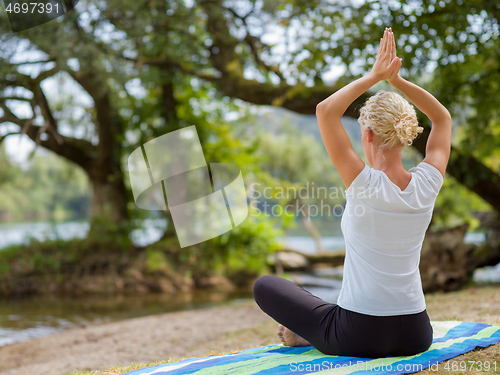 Image of woman meditating and doing yoga exercise