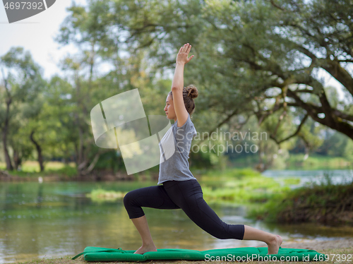 Image of woman meditating and doing yoga exercise