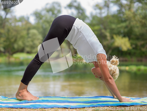 Image of woman meditating and doing yoga exercise