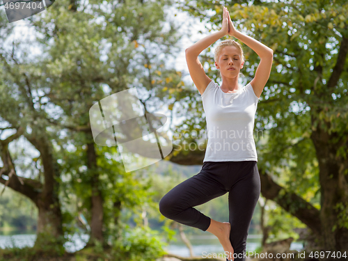 Image of woman meditating and doing yoga exercise