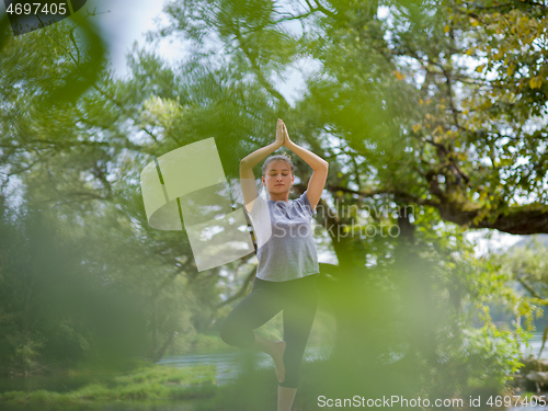 Image of woman meditating and doing yoga exercise