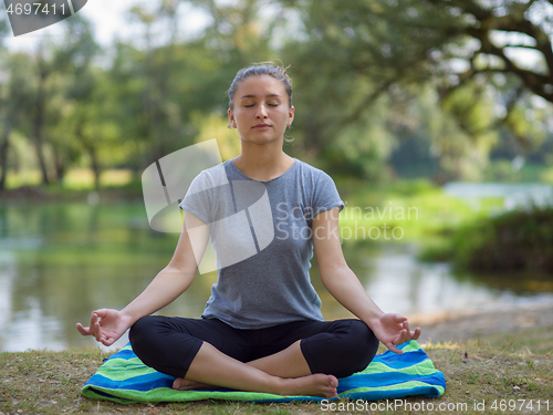 Image of woman meditating and doing yoga exercise