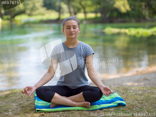 Image of woman meditating and doing yoga exercise