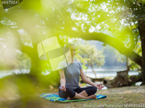 Image of woman meditating and doing yoga exercise