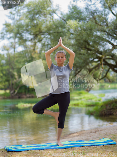 Image of woman meditating and doing yoga exercise