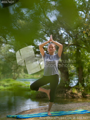 Image of woman meditating and doing yoga exercise