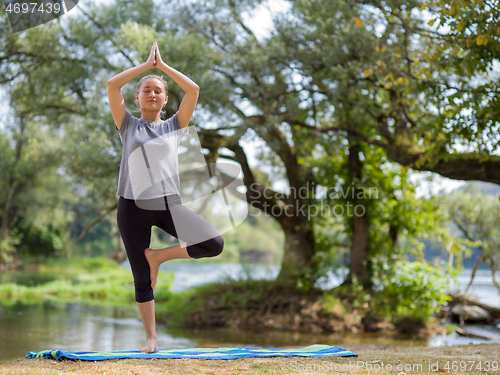 Image of woman meditating and doing yoga exercise