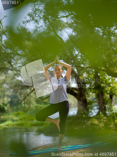 Image of woman meditating and doing yoga exercise