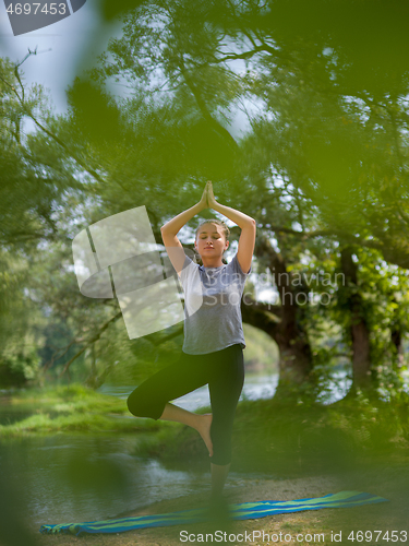 Image of woman meditating and doing yoga exercise