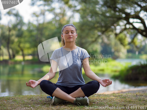 Image of woman meditating and doing yoga exercise