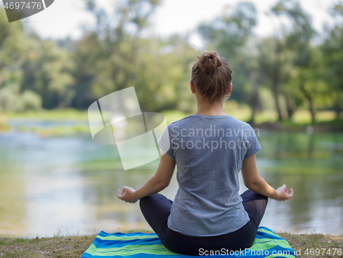 Image of woman meditating and doing yoga exercise