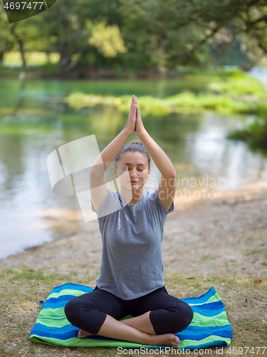 Image of woman meditating and doing yoga exercise