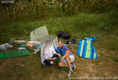 Image of Couple in love enjoying picnic time