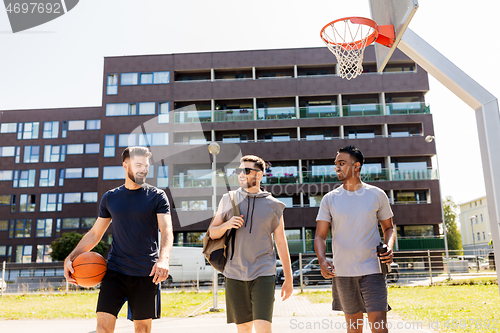 Image of group of male friends going to play basketball