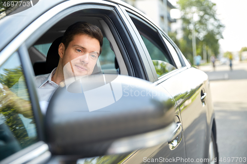 Image of man or driver driving car in summer