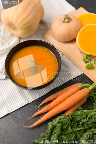 Image of close up of vegetable pumpkin cream soup in bowl