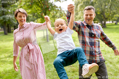 Image of happy family having fun at summer park