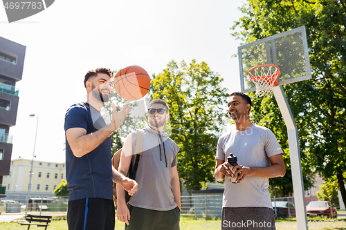 Image of group of male friends going to play basketball