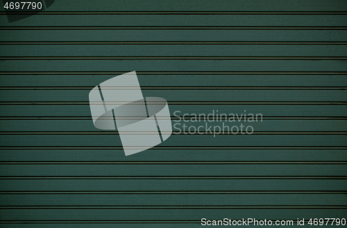 Image of Green wooden wall cladding background texture