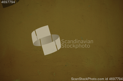 Image of Vintage style old ochre painted grunge wall