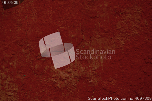 Image of Dark red background texture of a painted wall