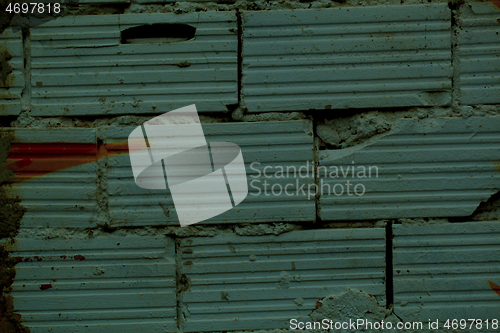 Image of Old broken bricks with striated surface pattern