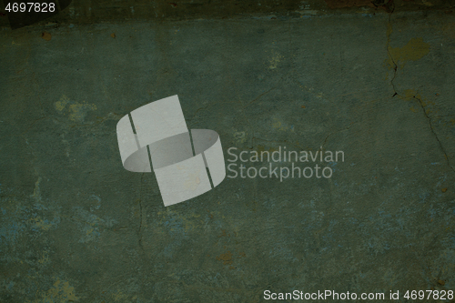 Image of Grungy dark green painted wall background