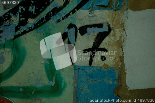 Image of Number 17 in spray painted graffiti detail