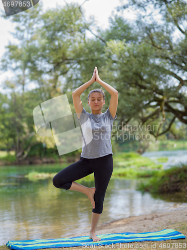 Image of woman meditating and doing yoga exercise