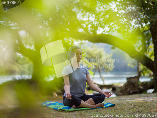 Image of woman meditating and doing yoga exercise