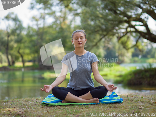 Image of woman meditating and doing yoga exercise