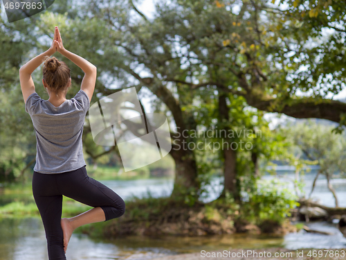 Image of woman meditating and doing yoga exercise