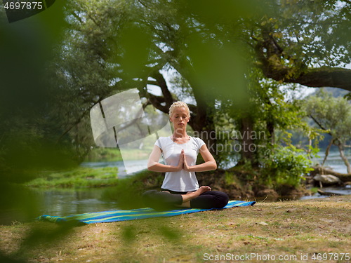 Image of woman meditating and doing yoga exercise