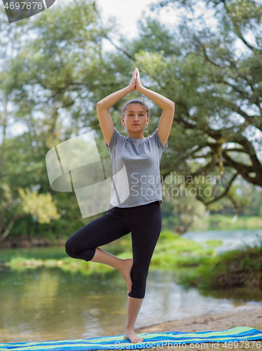 Image of woman meditating and doing yoga exercise