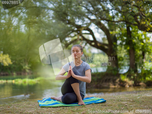 Image of woman meditating and doing yoga exercise