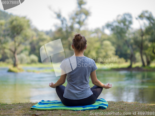 Image of woman meditating and doing yoga exercise