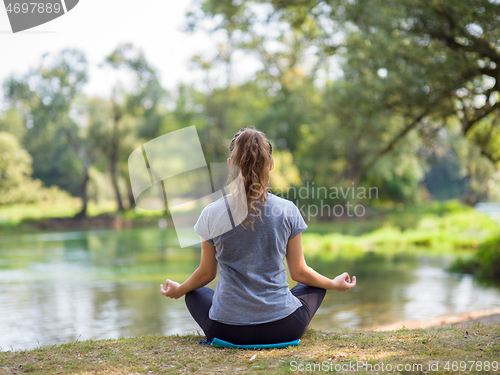 Image of woman meditating and doing yoga exercise