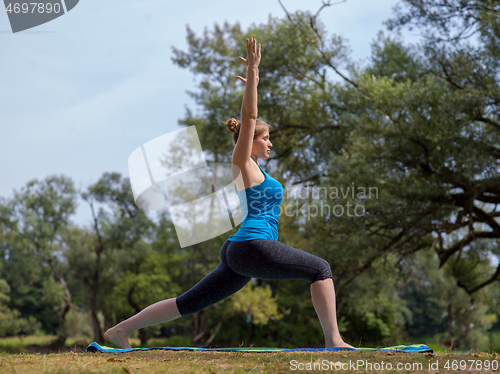 Image of woman meditating and doing yoga exercise