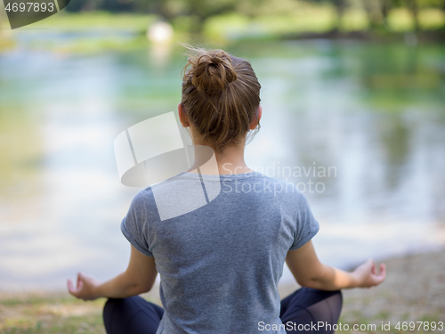 Image of woman meditating and doing yoga exercise