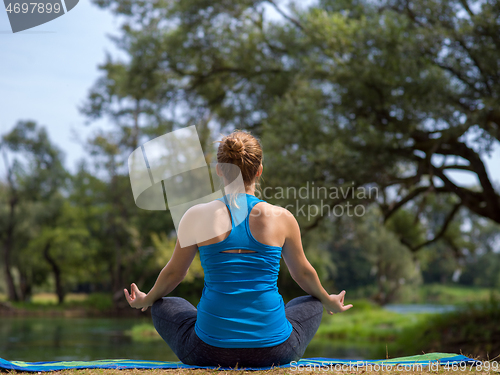 Image of woman meditating and doing yoga exercise
