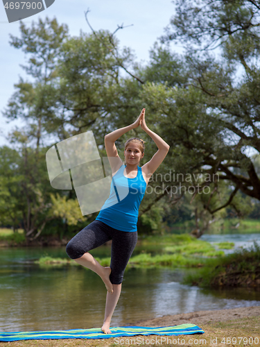 Image of woman meditating and doing yoga exercise