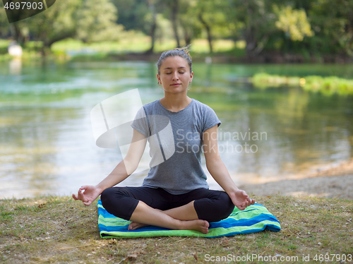 Image of woman meditating and doing yoga exercise