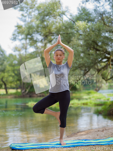 Image of woman meditating and doing yoga exercise