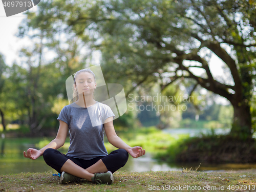 Image of woman meditating and doing yoga exercise