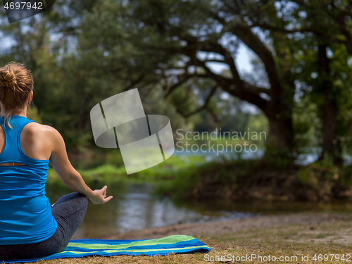 Image of woman meditating and doing yoga exercise