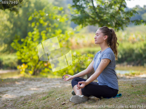 Image of woman meditating and doing yoga exercise