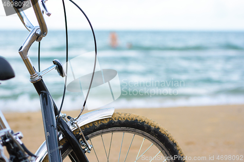 Image of Fragment of a bicycle close-up on the background of the sea