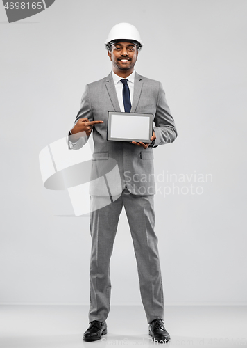 Image of indian architect in helmet with tablet computer