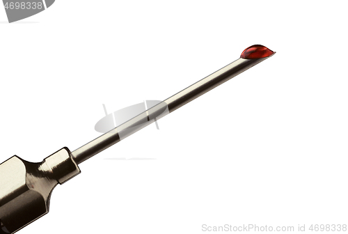 Image of Drop of blood at the tip of a hypodermic needle